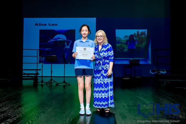 Alice with her Lower School award