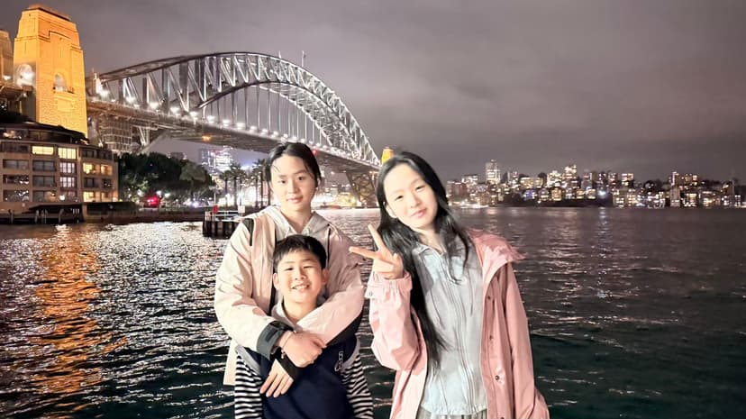 Alice Lou and her siblings at the Sydney Harbour Bridge in Australia